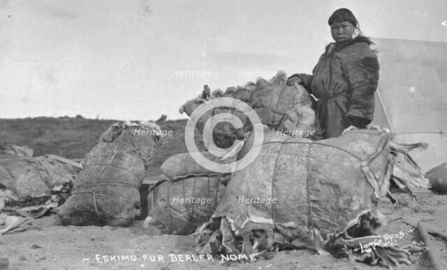 Eskimo fur dealer, between c1900 and c1930. Creator: Lomen Brothers.