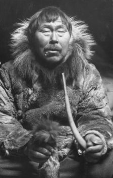 Eskimo smoking pipe, between c1900 and c1930. Creator: Unknown