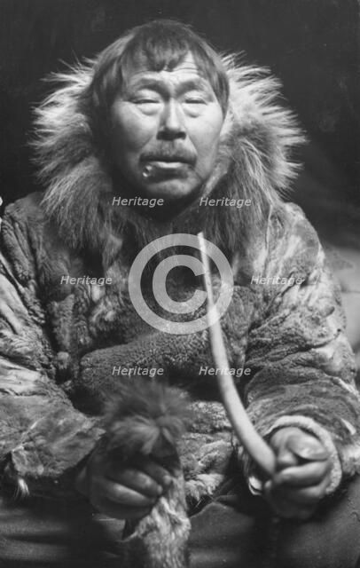 Eskimo smoking pipe, between c1900 and c1930. Creator: Unknown.