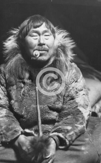 Eskimo smoking pipe, between c1900 and c1930. Creator: Unknown.