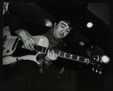 Esmond Selwyn playing the guitar at The Bell, Codicote, Hertfordshire, 22 February 1981. Creator: Denis Williams