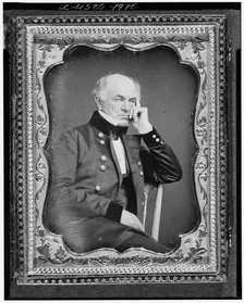 Ethan Allen Hitchcock, three-quarter length portrait, seated in chair..., between 1851 and 1860. Creator: Unknown