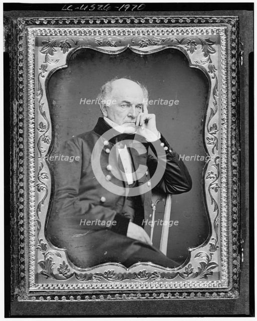 Ethan Allen Hitchcock, three-quarter length portrait, seated in chair..., between 1851 and 1860. Creator: Unknown.