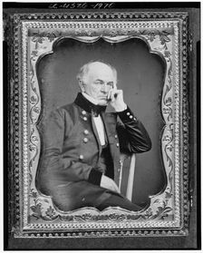 Ethan Allen Hitchcock, three-quarter length portrait, seated in chair..., between 1851 and 1860. Creator: Unknown