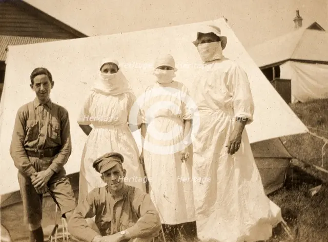 Ethel Newland and fellow nurses and military, c1918. Creator: Unknown.