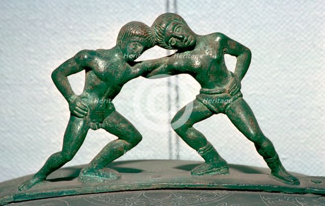 Etruscan bronze handle of a cista, showing Peleus and Thetis wrestling. Artist: Unknown