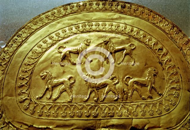 Etruscan gold fibula decorated with five lions, from the Regolini Galassi tomb.