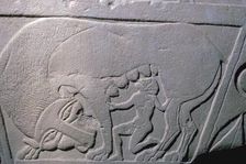 Etruscan grave-slab showing a man being suckled by a beast, 5th century