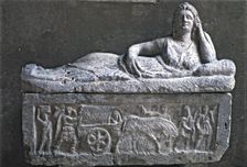 Etruscan Sarcophagus with the sculpture of a woman on the cover