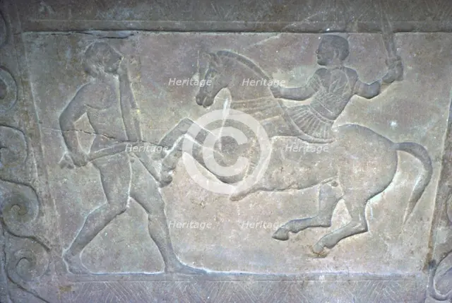 Etruscan Stela Detail, Combat between horseman and foot-soldier, c4th century BC. Artist: Unknown.