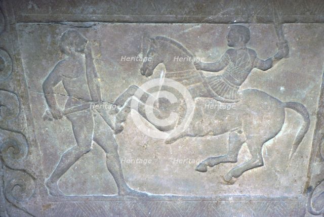 Etruscan Stela Detail, Combat between horseman and foot-soldier, c4th century BC. Artist: Unknown.