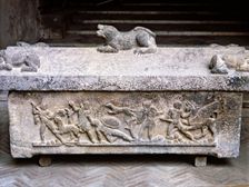 Etruscan stone sarcophagus with reliefs of Eastern influence