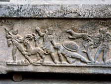 Etruscan stone sarcophagus with reliefs of Eastern influence, with scenes of hunting and battle