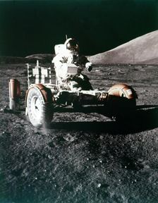 Eugene Cernan using the Rover on the lunar surface, Apollo 17 mission, December 1972. Creator: NASA