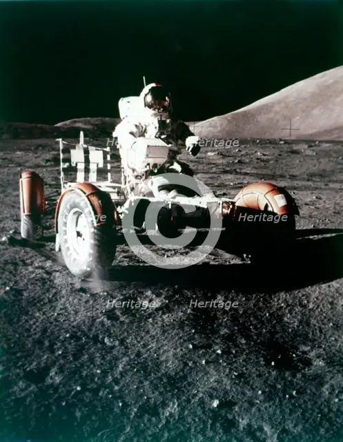 Eugene Cernan using the Rover on the lunar surface, Apollo 17 mission, December 1972. Creator: NASA.