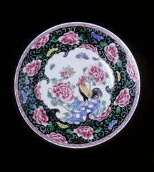 European copy of a Chinese famille noire plate with cockerel looking at a butterfly, 20th century