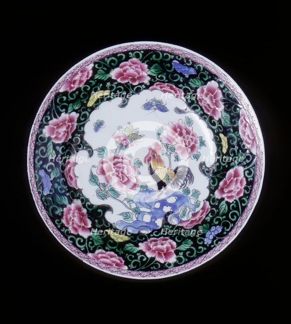 European copy of a Chinese famille noire plate with cockerel looking at a butterfly, 20th century. Artist: Unknown