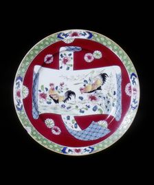 European copy of a Chinese famille rose plate with two cockerels in a scroll, early 20th century