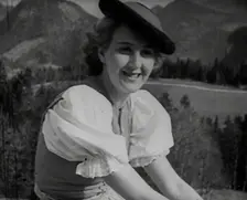 Eva Braun Sitting on a Wall, 1942. Creator: British Pathe Ltd