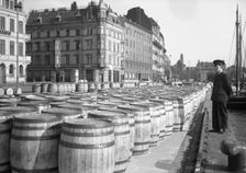 Evaporated milk in barrels for export on the quayside, Malmö, Sweden, May 1947. Creator: Otto Ohm