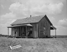 Ex-farm family, now on Works Progress Administration (WPA), US64, eastern Oklahoma, 1938. Creator: Dorothea Lange