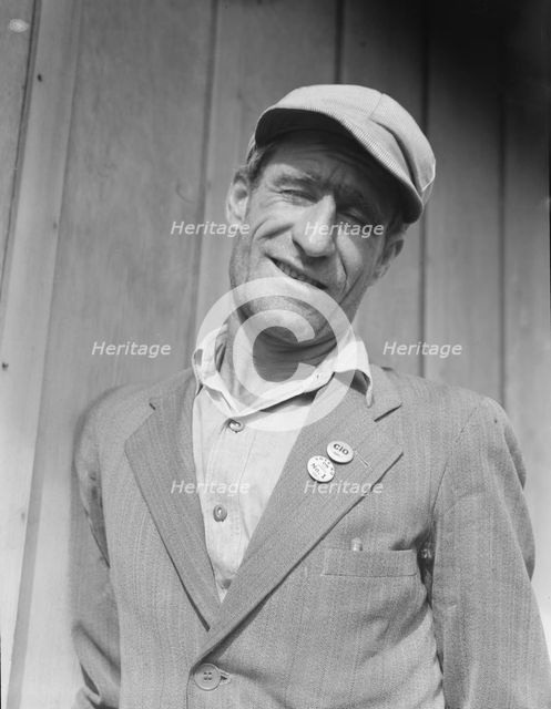 Ex-Oklahoma farmer, one of the leaders in the strike of cotton pickers, Kern County, CA, 1938. Creator: Dorothea Lange.