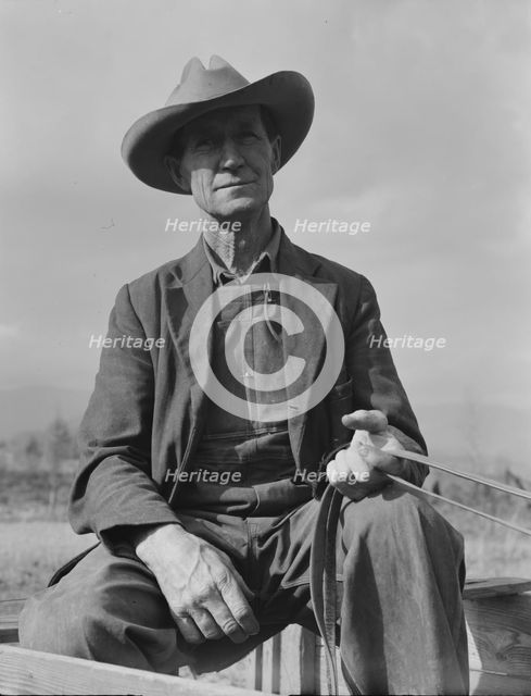 Ex-Nebraska farmer now a stump farmer, FSA Borrower, Bonner County, Idaho, 1939. Creator: Dorothea Lange.