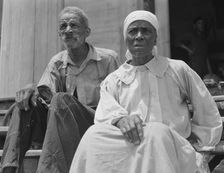 Ex-slave and wife who live in a decaying plantation house, Greene County, Georgia, 1937. Creator: Dorothea Lange