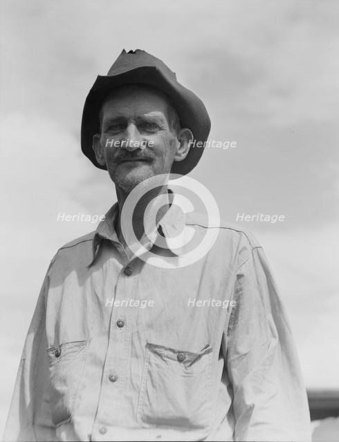 Ex-tenant farmer on relief grant in the Imperial Valley, California, 1937. Creator: Dorothea Lange.