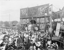 Exterior general view of Purchases Menagerie and crowd at Witney Fair, Oxfordshire, 1860-1922. Creator: Henry Taunt
