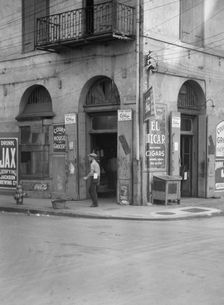 Exterior of Court House Grocer, New Orleans, between 1920 and 1926. Creator: Arnold Genthe