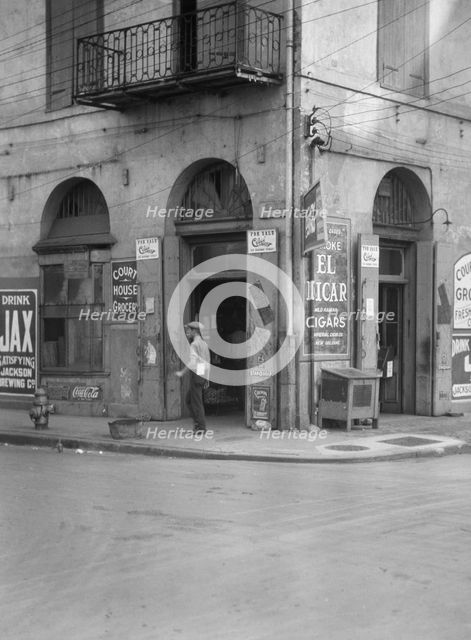 Exterior of Court House Grocer, New Orleans, between 1920 and 1926. Creator: Arnold Genthe.