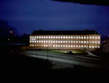 Exterior of an engineering industry building at night, Jönköping, Sweden, 1954. Creator: Göran Algård