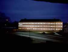 Exterior of an engineering industry building at night, Jönköping, Sweden, 1954. Creator: Göran Algård