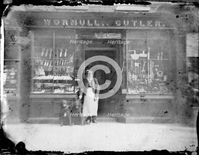 Exterior of Wormull & Cutler, a hardware shop, (late 19th century?). Creator: Unknown.
