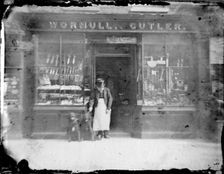 Exterior of Wormull & Cutler, a hardware shop, (late 19th century?). Creator: Unknown