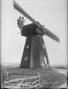 Exterior of the Old Mill, Northbourne, Kent with the miller, Mr J Court, stood outside, 1933. Creator: HES Simmons