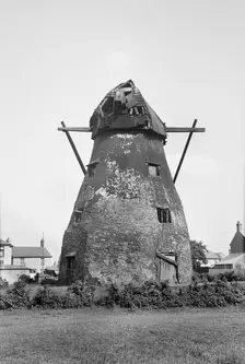 Exterior view of the derelict tower mill on Mill Green, Warboys, Cambridgeshire, 1936. Creator: HES Simmons