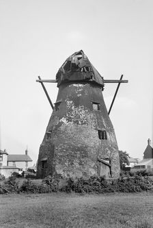 Exterior view of the derelict tower mill on Mill Green, Warboys, Cambridgeshire, 1936. Creator: HES Simmons