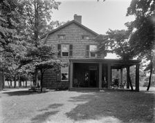 Exterior view of house, end view, Mrs. Robert Hoe, Jr., Port Washington, N.Y., between 1900 and 1910 Creator: Unknown