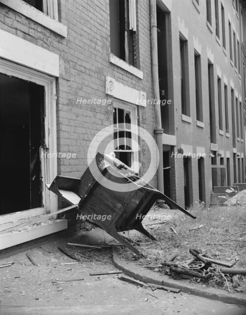 Exteriors of houses being wrecked on Independence Avenue, Washington, D.C, 1942. Creator: Gordon Parks.