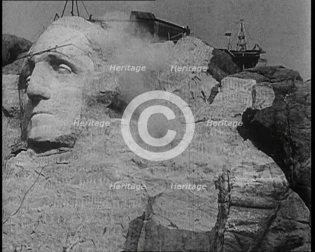 External Shot of Mount Rushmore Showing a Sculpture of American President George Wash..., 1933. Creator: British Pathe Ltd.