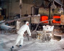 Extracting a steel bath from the furnace at Ideal Standard in Hull, Humberside, 1967. Artist: Michael Walters