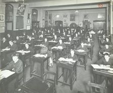 Examination class for male and female students, Queen's Road Evening Institute, London, 1908