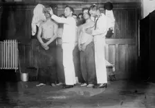 Examining new Navy Recruits, between c1910 and c1915. Creator: Bain News Service