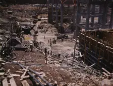 Excavating within the log cofferdam during an early stage of construction, Douglas Dam, Tenn., 1942. Creator: Alfred T Palmer
