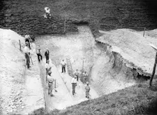 Excavation at Avebury, Wiltshire, 1909. Artist: Harold St George Gray