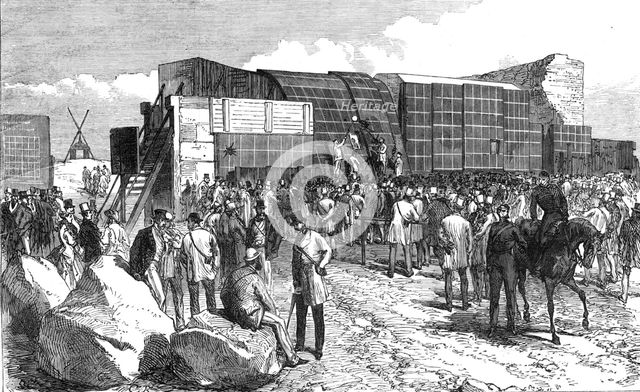 Experiments at Shoeburyness,...Plymouth Breakwater Target: examining the target after firing, 1868. Creator: C. R..