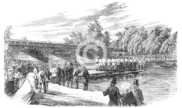 Experiments with Captain Fowke's pontoon bridge on the Serpentine, 1860. Creator: Unknown.