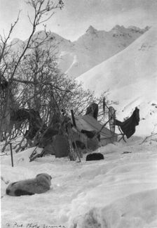 Explorer's tent and belongings anchored securely so they won't be blown away, c1900-c1930. Creator: Unknown
